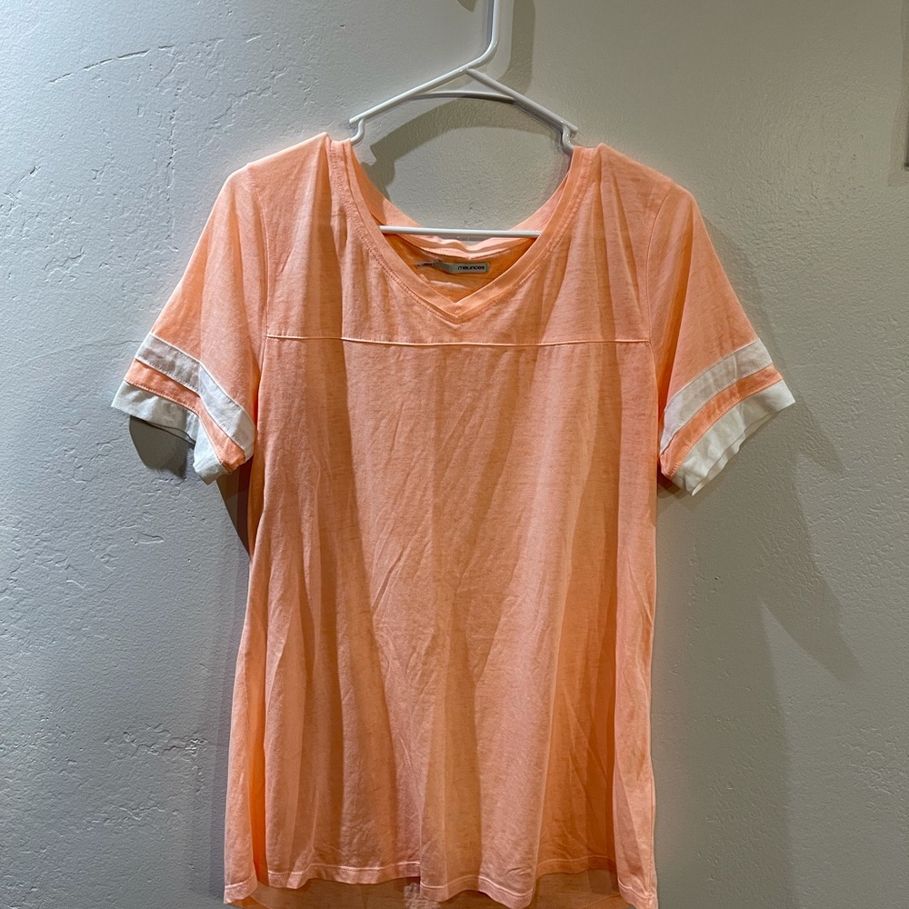 Light Orange with White stripes on sleeve.
